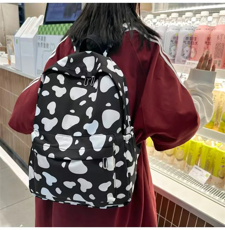 Bolso de moda de alta calidad para niños, mochilas escolares con estampado de vaca para niños y niñas, mochila de Boutique para adolescentes al aire libre