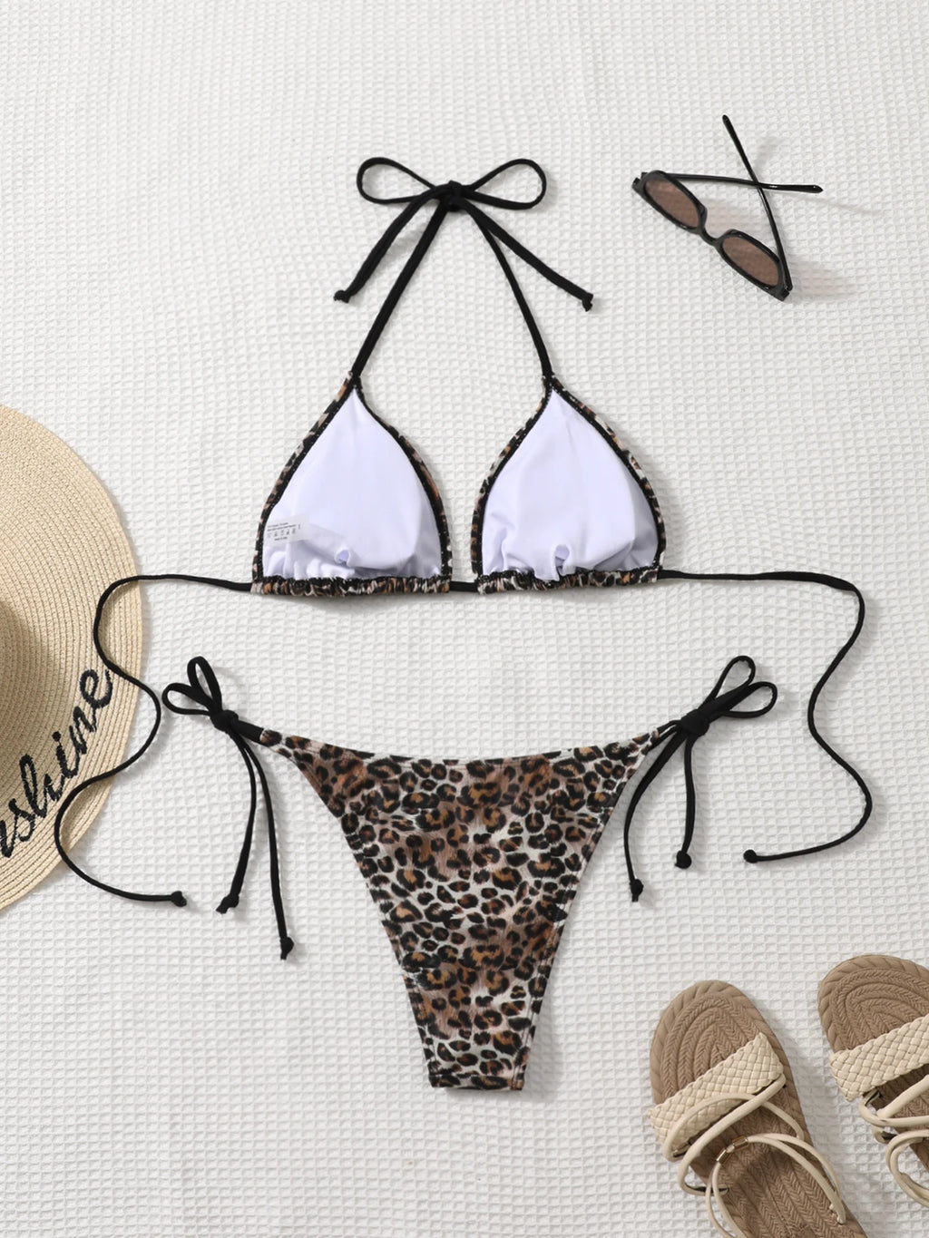 Traje de baño sexy plisado sin espalda con estampado de cebra Shencai, diseño de realce de glúteos, estilo europeo y americano, para venta transfronteriza.