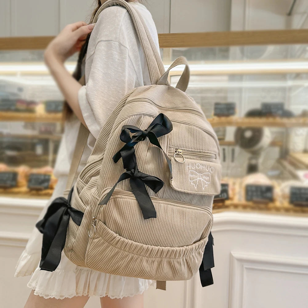 2025 Nueva mochila de estilo coreano para ir al trabajo, mochila versátil para estudiantes universitarios, mochila de alta belleza, mochila con lazo