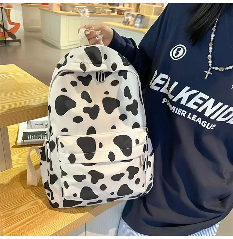 Bolso de moda de alta calidad para niños, mochilas escolares con estampado de vaca para niños y niñas, mochila de Boutique para adolescentes al aire libre