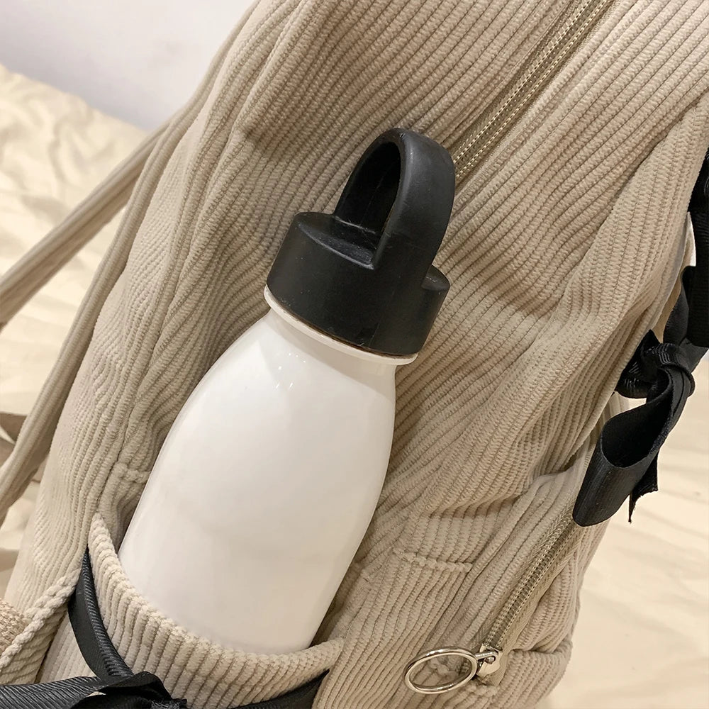2025 Nueva mochila de estilo coreano para ir al trabajo, mochila versátil para estudiantes universitarios, mochila de alta belleza, mochila con lazo
