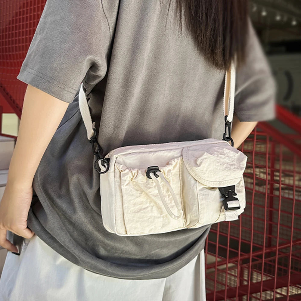 Bolso bandolera deportivo, diseño de estilo de ropa de trabajo, bolso de hombro individual, bolso de pecho ligero multifuncional, bolso para teléfono móvil