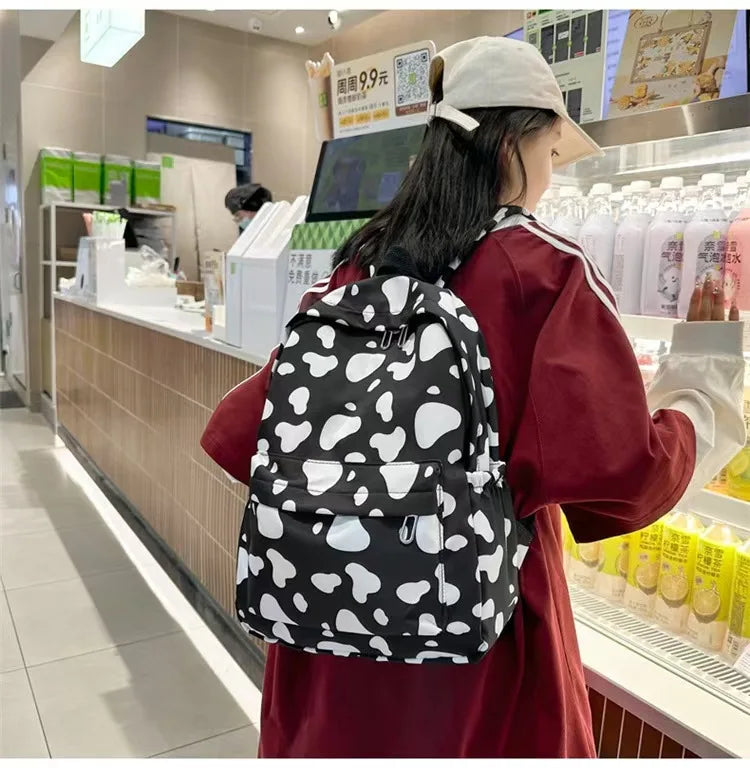 Bolso de moda de alta calidad para niños, mochilas escolares con estampado de vaca para niños y niñas, mochila de Boutique para adolescentes al aire libre