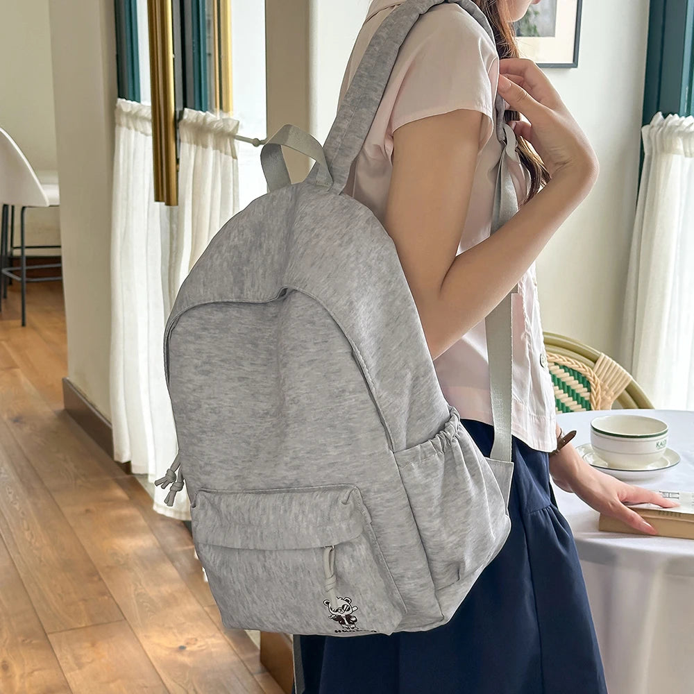 Mochila Informal Gris Jaspeado con Bordado, Mochila Ligera de Tela Suave, Bolso Minimalista para Viajes Diarios y Uso Casual