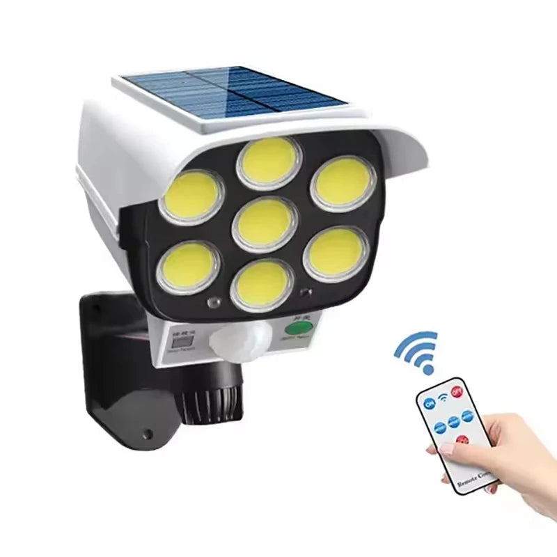 Lámpara Solar de Pared con Sensor de Movimiento y Cámara de Simulación 77 LED