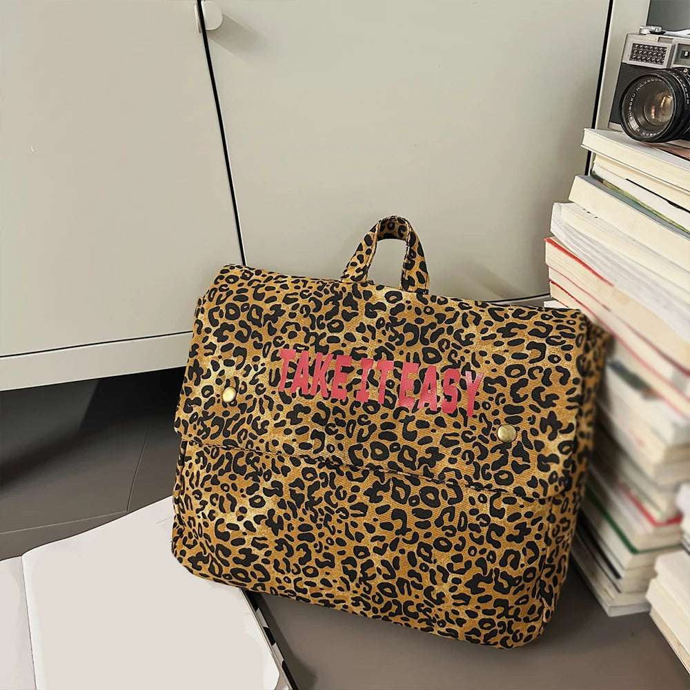 Mochila de lona con estampado de leopardo versión coreana 2025, nueva mochila de viaje de gran capacidad para primavera/verano, mochila para estudiantes