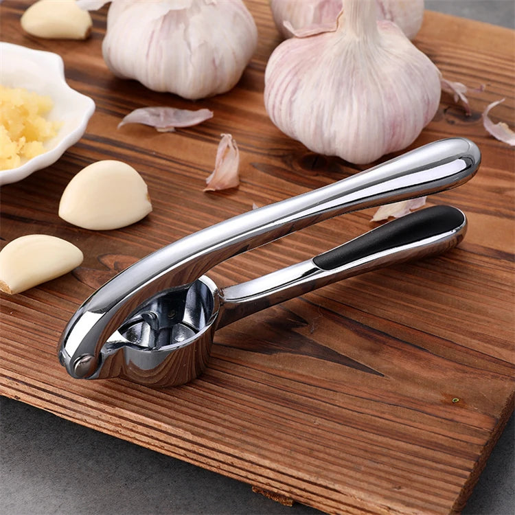 LMETJMA Prensa de ajo Premium, picadora de ajo de acero inoxidable, trituradora de ajo, herramientas de cocina fáciles de exprimir y limpiar JT202