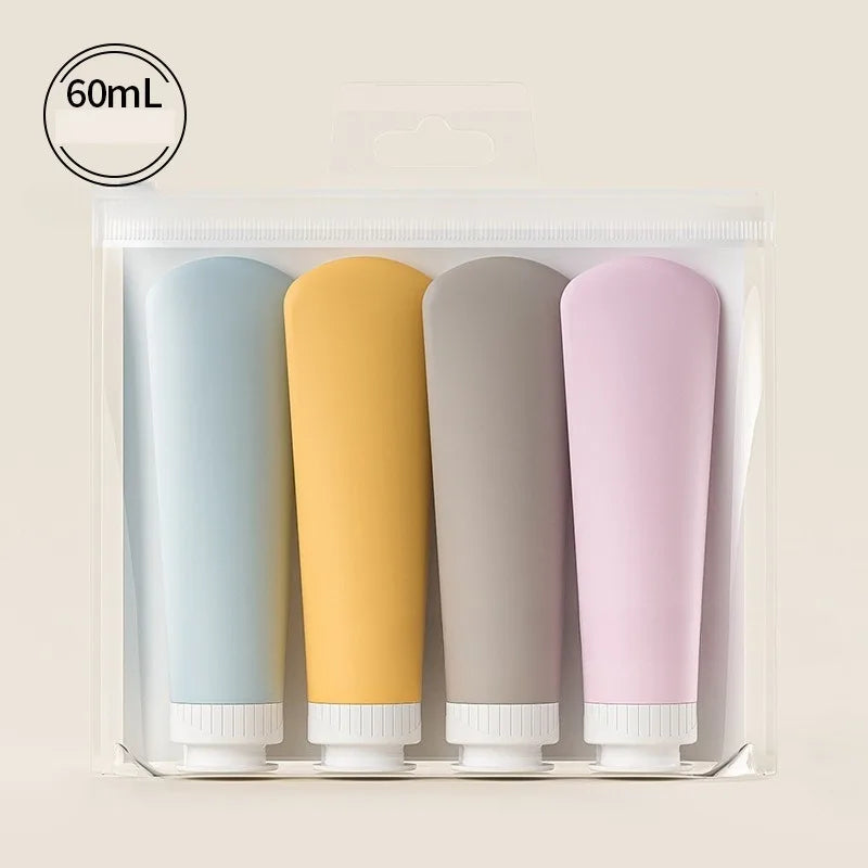 Set de 4 Botellas de Viaje con Tubo Dosificador