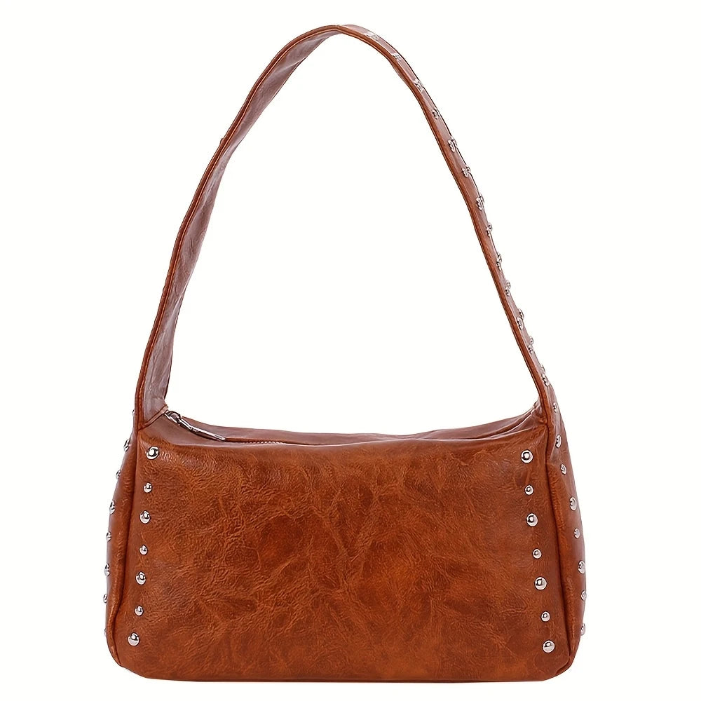Bolso pequeño Retro, versátil para mujer, verano 2025, nueva moda, bolso de un solo hombro para axila, bolso de almohada con diseño de nicho con remaches