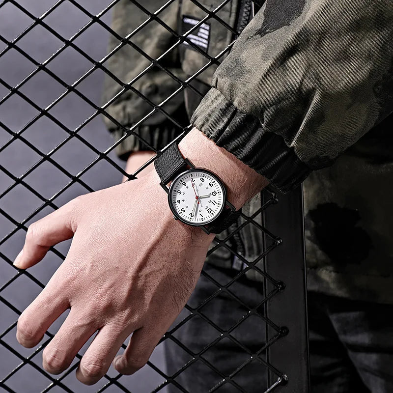 Relojes militares YIKAZE para hombre, relojes deportivos luminosos resistentes a los golpes para hombre, correa de lona, reloj de pulsera Simple de cuarzo para exteriores para hombre