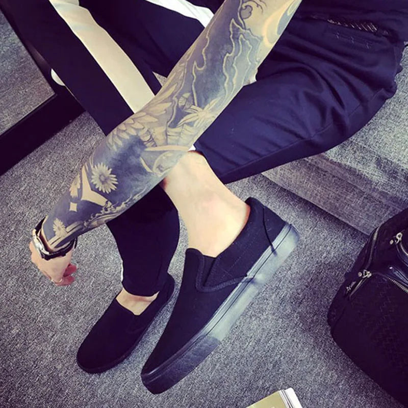 Zapatos sin cordones Cool Young Man Street calzado negro puro zapatos planos transpirables para hombre zapatos casuales de talla grande 45