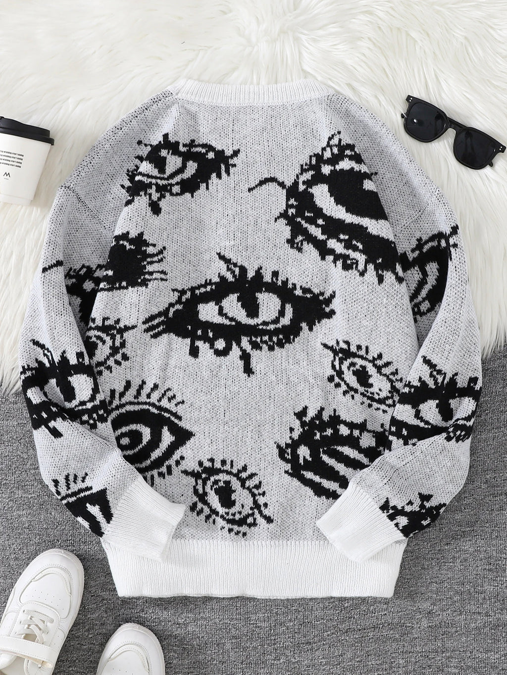 Nuevo Jersey Popular de otoño e invierno con diseño de Jacquard de ojos abstractos, suéter informal de punto con cuello redondo para hombre