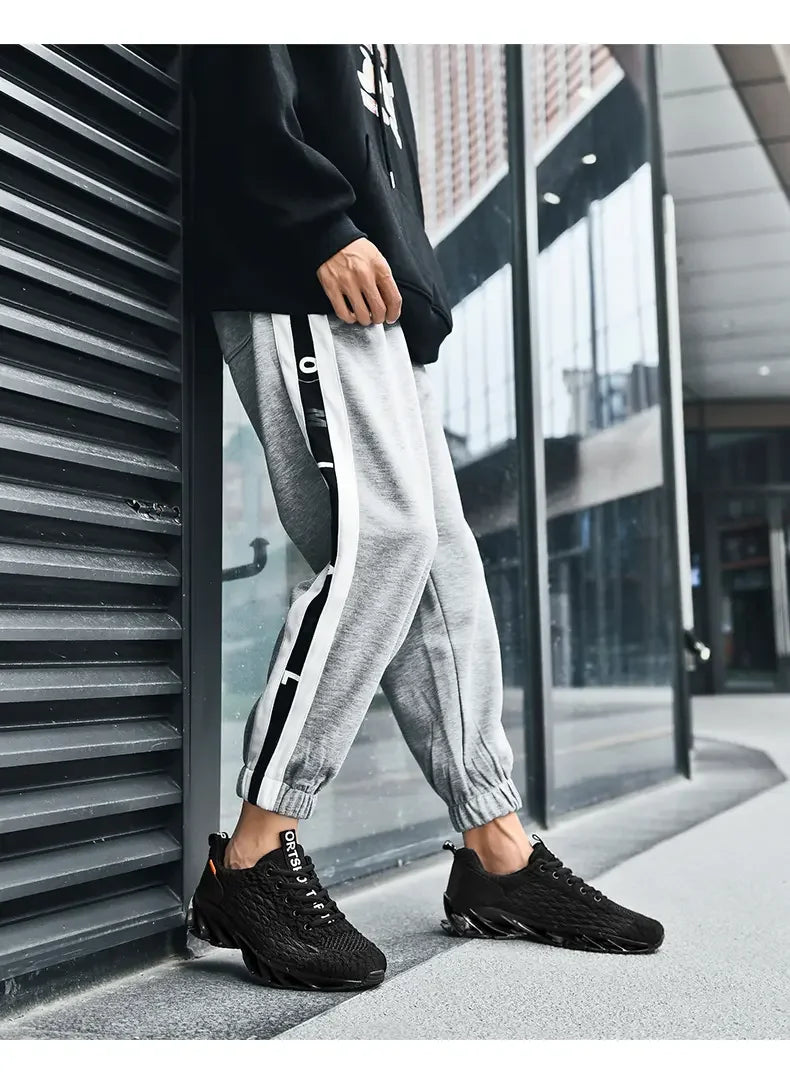 Zapatillas deportivas transpirables de malla unisex con suela cuchilla