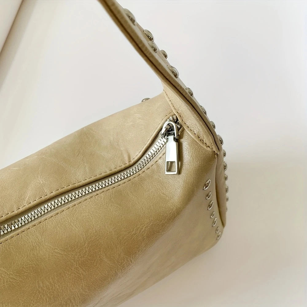 Bolso pequeño Retro, versátil para mujer, verano 2025, nueva moda, bolso de un solo hombro para axila, bolso de almohada con diseño de nicho con remaches