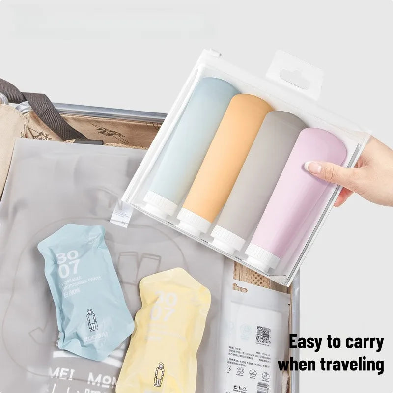 Set de 4 Botellas de Viaje con Tubo Dosificador