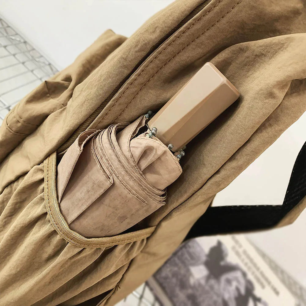 2025 nueva mochila plegable para mujer, mochila de gran capacidad, mochila de ordenador versión coreana Simple