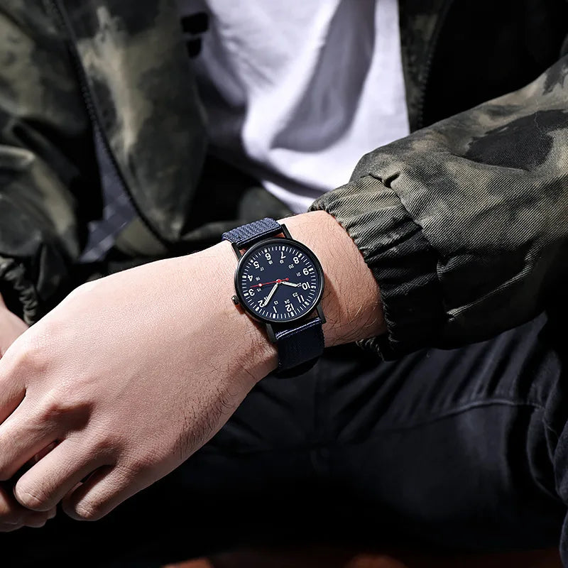 Relojes militares YIKAZE para hombre, relojes deportivos luminosos resistentes a los golpes para hombre, correa de lona, reloj de pulsera Simple de cuarzo para exteriores para hombre