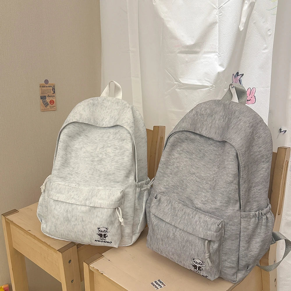 Mochila Informal Gris Jaspeado con Bordado, Mochila Ligera de Tela Suave, Bolso Minimalista para Viajes Diarios y Uso Casual
