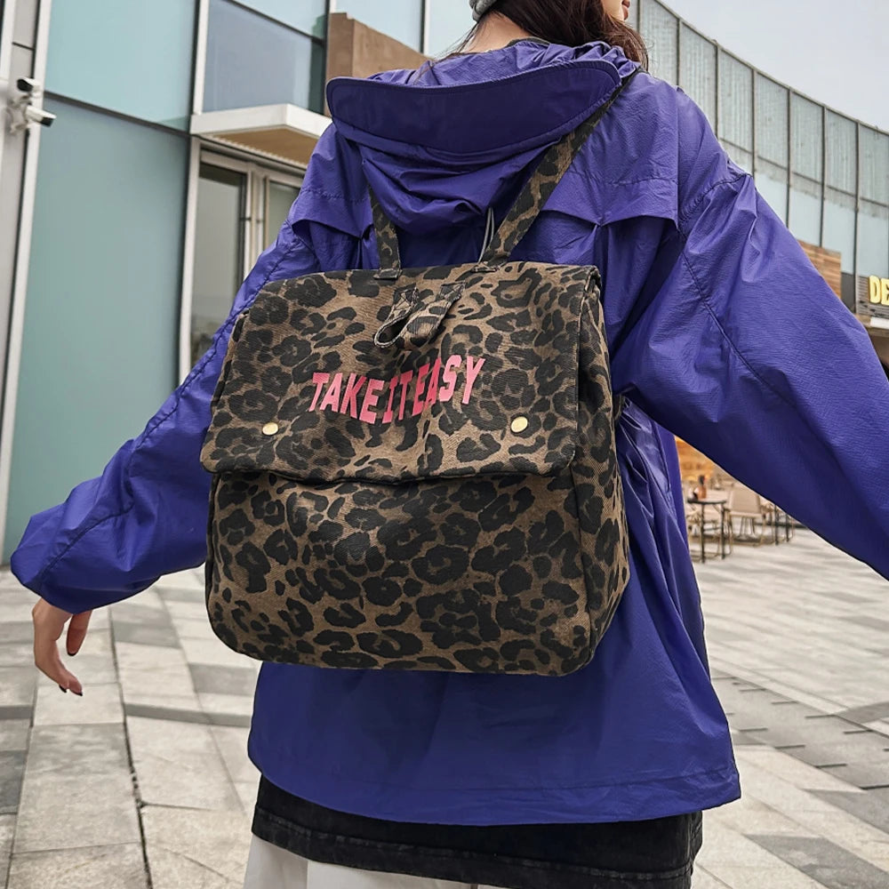 Mochila de lona con estampado de leopardo versión coreana 2025, nueva mochila de viaje de gran capacidad para primavera/verano, mochila para estudiantes