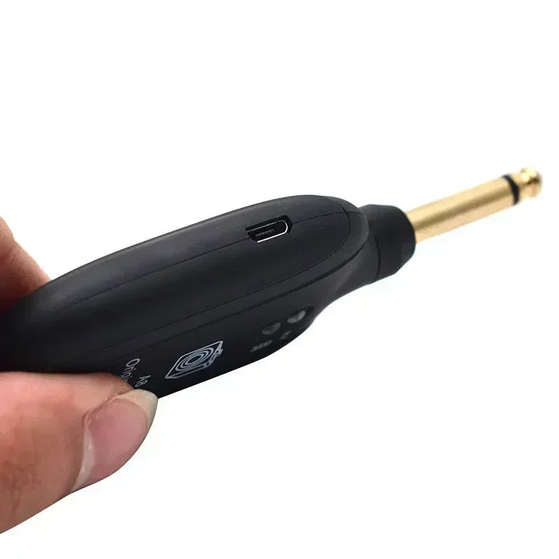 Transmisor y receptor inalámbrico para guitarra de 50M, sonido original sin demora, recargable, para guitarra eléctrica, bajo, ukelele, uso en escenario y estudio.