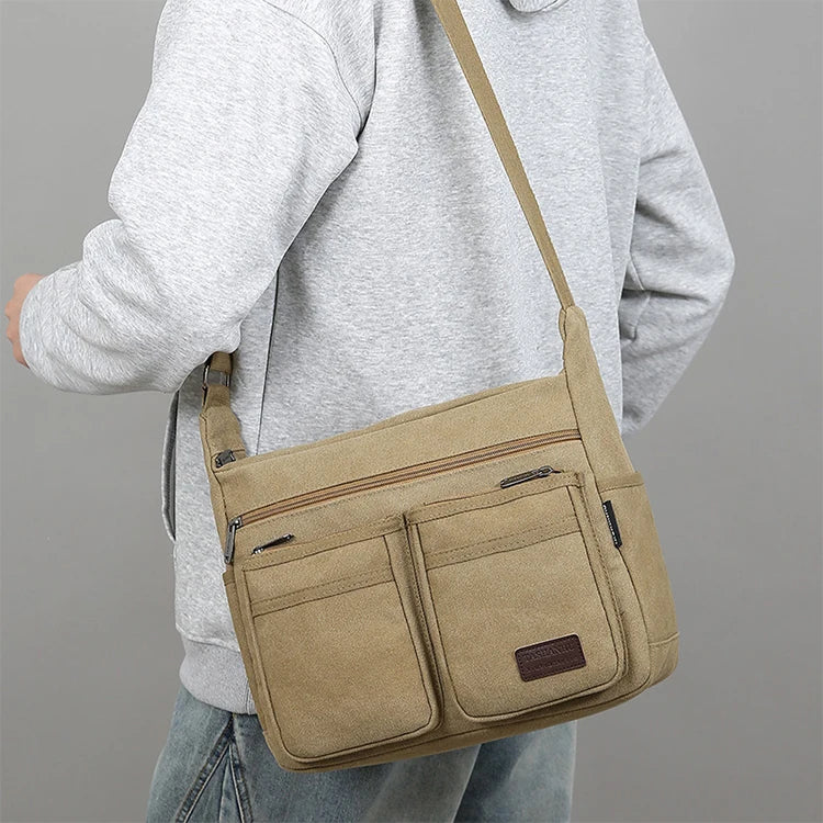 Bolso cruzado informal de negocios neutro: correas ajustables para los hombros, múltiples compartimentos con cremallera, paño de poliéster negro duradero