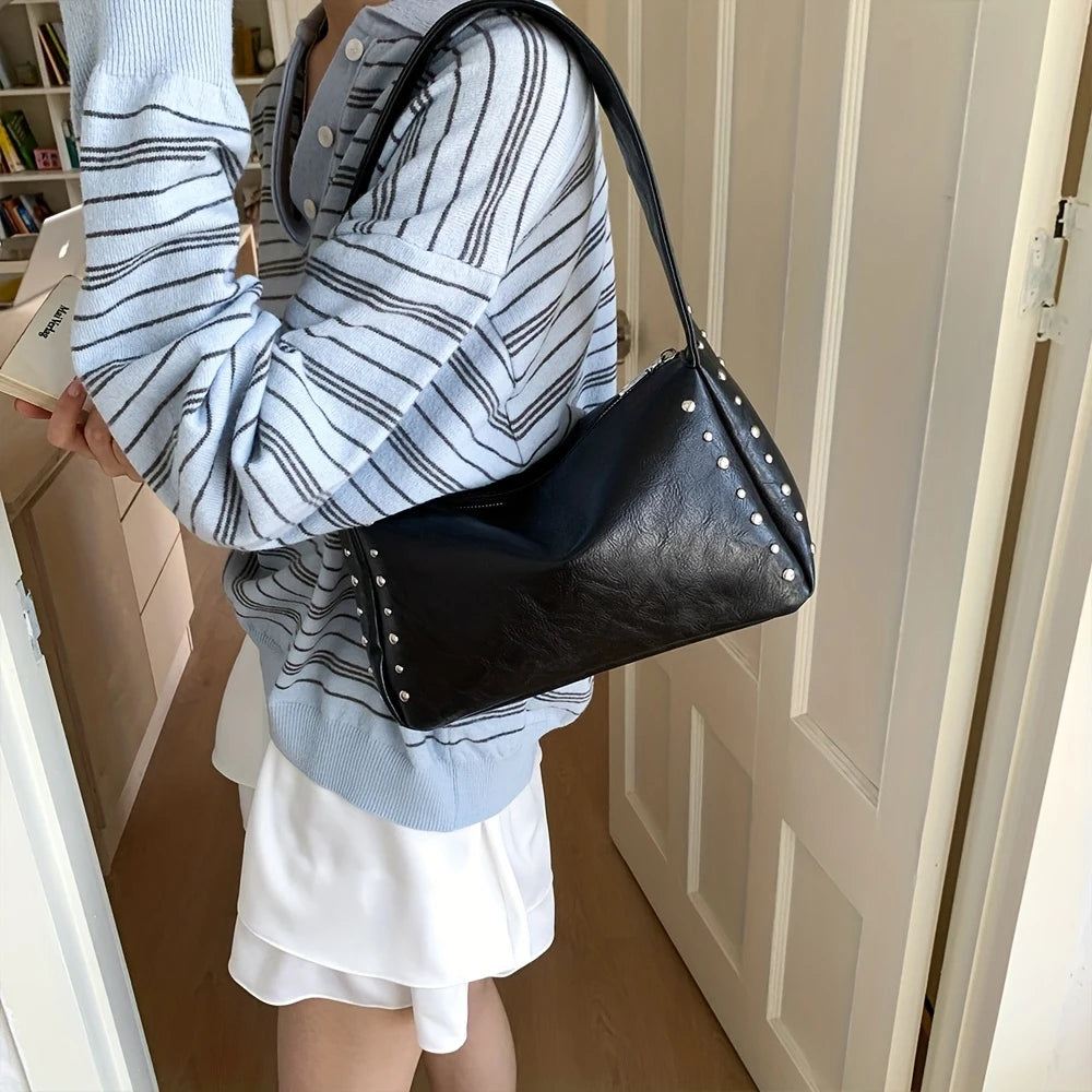 Bolso pequeño Retro, versátil para mujer, verano 2025, nueva moda, bolso de un solo hombro para axila, bolso de almohada con diseño de nicho con remaches