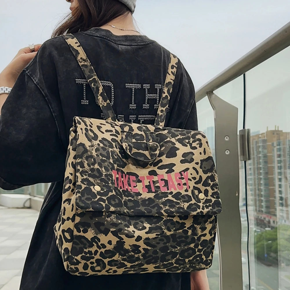Mochila de lona con estampado de leopardo versión coreana 2025, nueva mochila de viaje de gran capacidad para primavera/verano, mochila para estudiantes