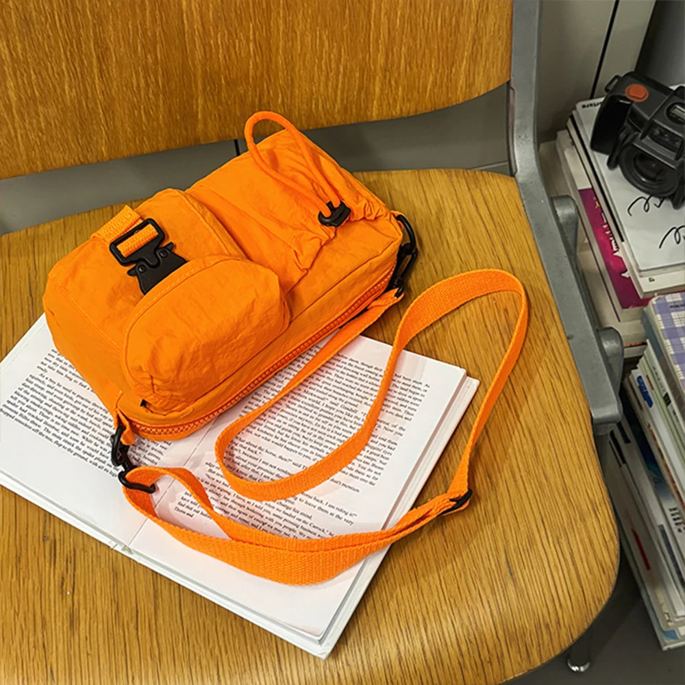Bolso bandolera deportivo, diseño de estilo de ropa de trabajo, bolso de hombro individual, bolso de pecho ligero multifuncional, bolso para teléfono móvil