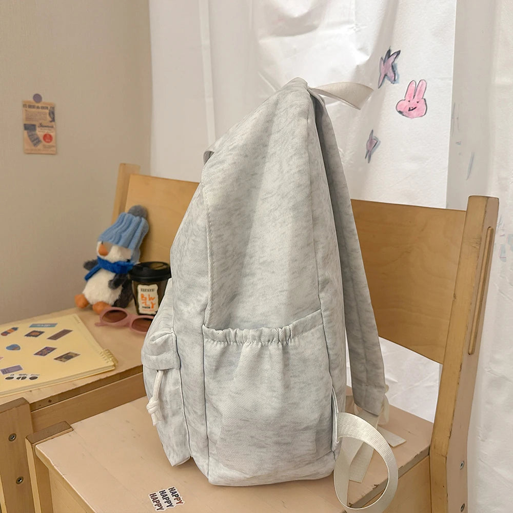 Mochila Informal Gris Jaspeado con Bordado, Mochila Ligera de Tela Suave, Bolso Minimalista para Viajes Diarios y Uso Casual