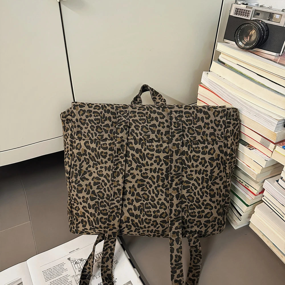 Mochila de lona con estampado de leopardo versión coreana 2025, nueva mochila de viaje de gran capacidad para primavera/verano, mochila para estudiantes