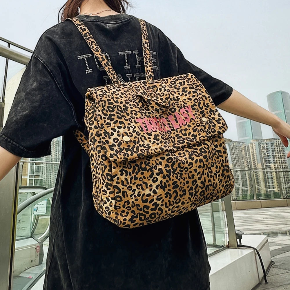Mochila de lona con estampado de leopardo versión coreana 2025, nueva mochila de viaje de gran capacidad para primavera/verano, mochila para estudiantes