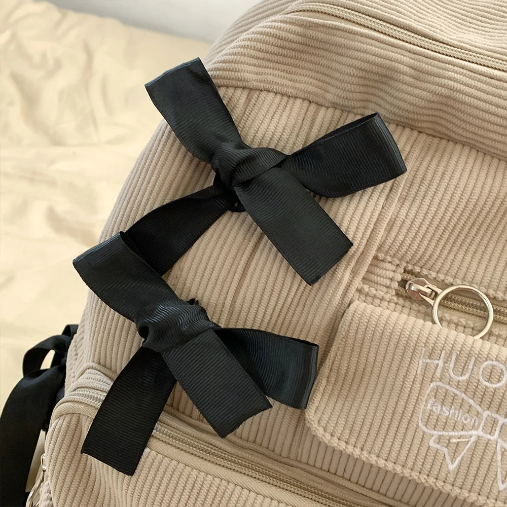 2025 Nueva mochila de estilo coreano para ir al trabajo, mochila versátil para estudiantes universitarios, mochila de alta belleza, mochila con lazo