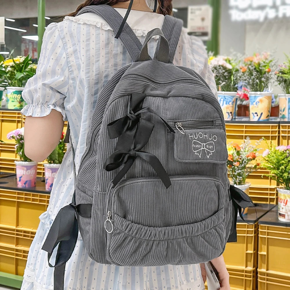 2025 Nueva mochila de estilo coreano para ir al trabajo, mochila versátil para estudiantes universitarios, mochila de alta belleza, mochila con lazo