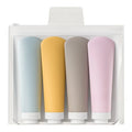 Set de 4 Botellas de Viaje con Tubo Dosificador