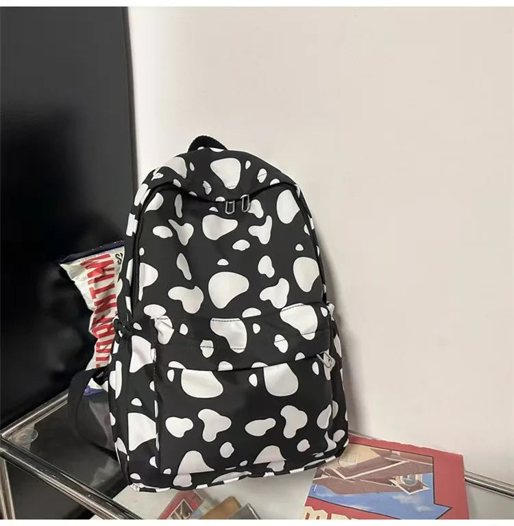 Bolso de moda de alta calidad para niños, mochilas escolares con estampado de vaca para niños y niñas, mochila de Boutique para adolescentes al aire libre