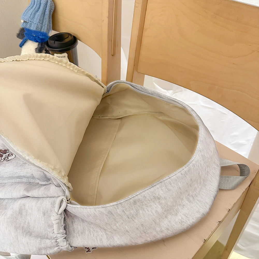 Mochila Casual con Bordado Gris Jaspeado, Ligera y Minimalista