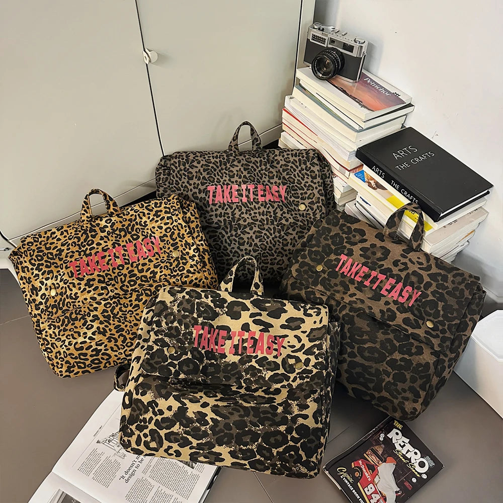 Mochila de lona con estampado de leopardo versión coreana 2025, nueva mochila de viaje de gran capacidad para primavera/verano, mochila para estudiantes